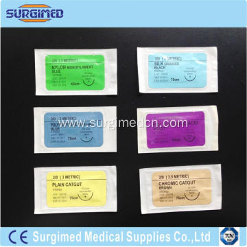 Disposable medical sterilised surgical suture with needle